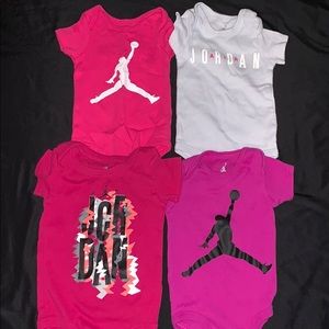 Jordan 0-6 month onesies .
